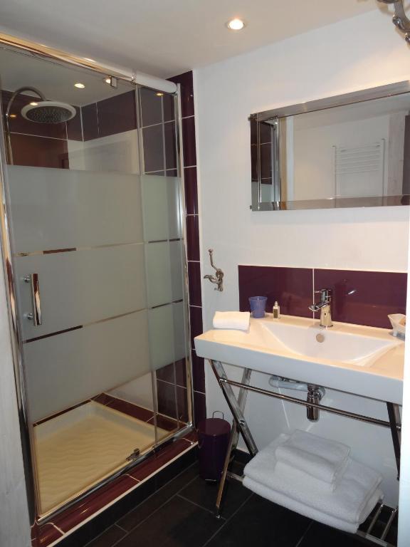 Hotel Le P'Tit Beaumont Habitación foto